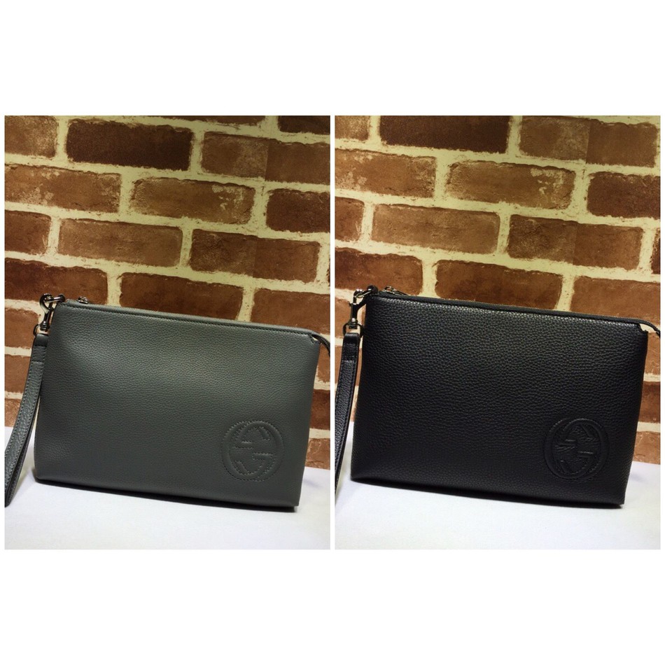 Gucci GG embossed grey leather clutch