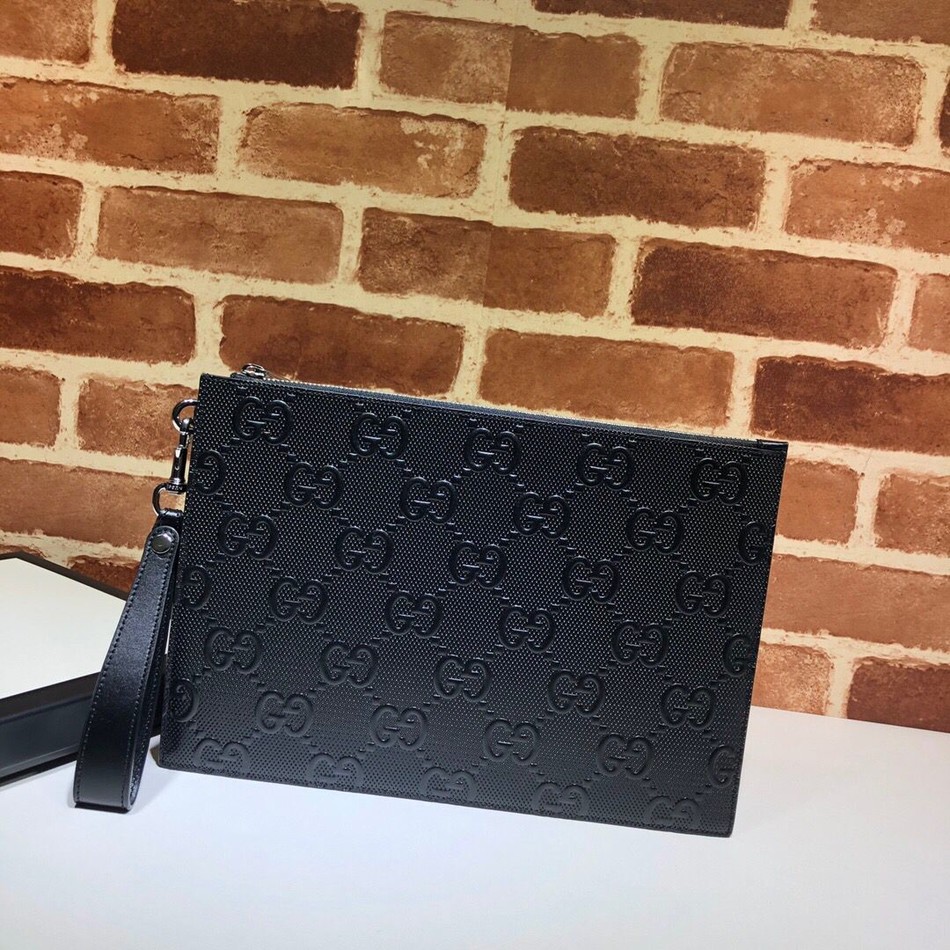 Gucci GG print embossed clutch