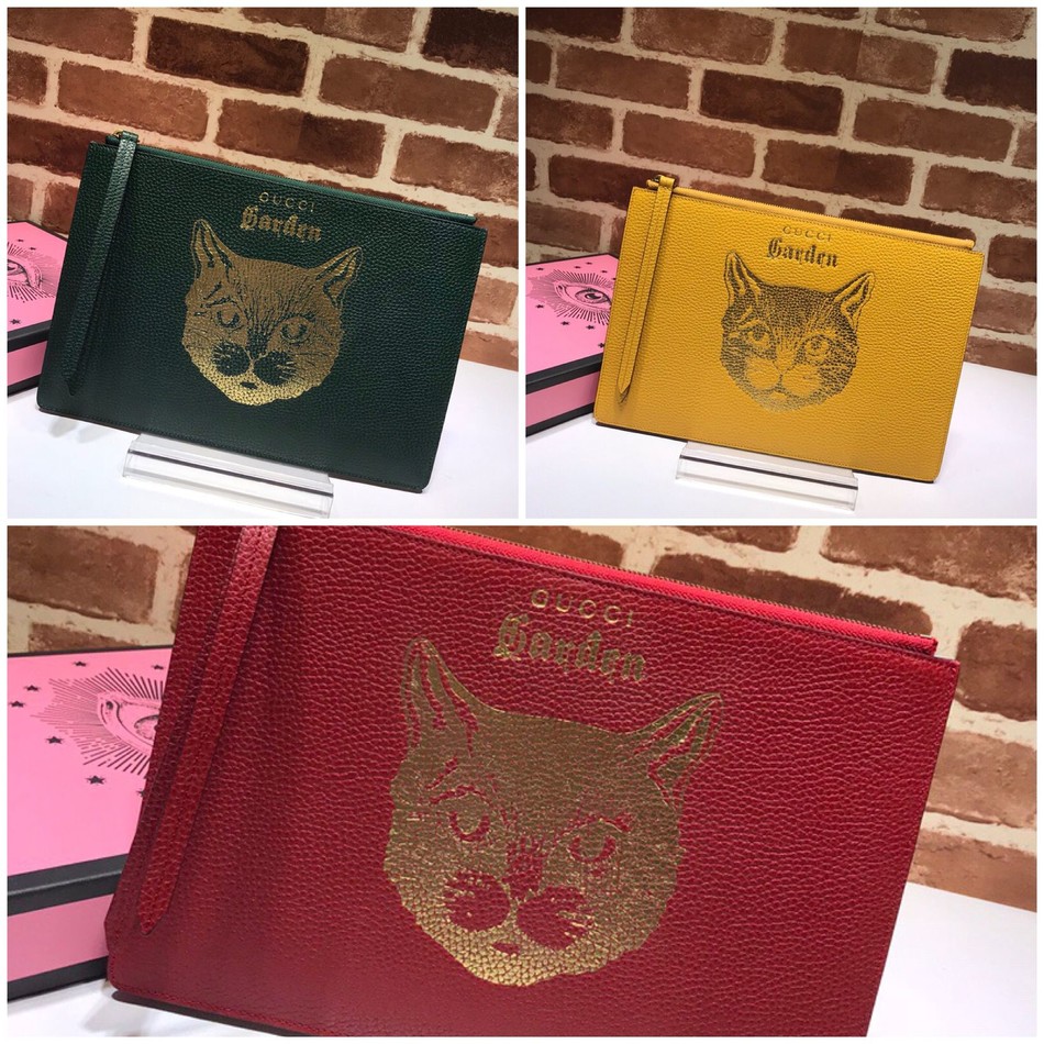 Gucci cat head pattern clutch