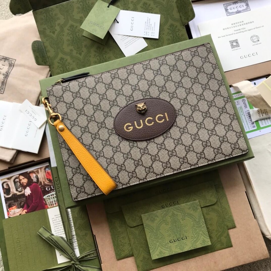 Gucci GG Supreme canvas clutch