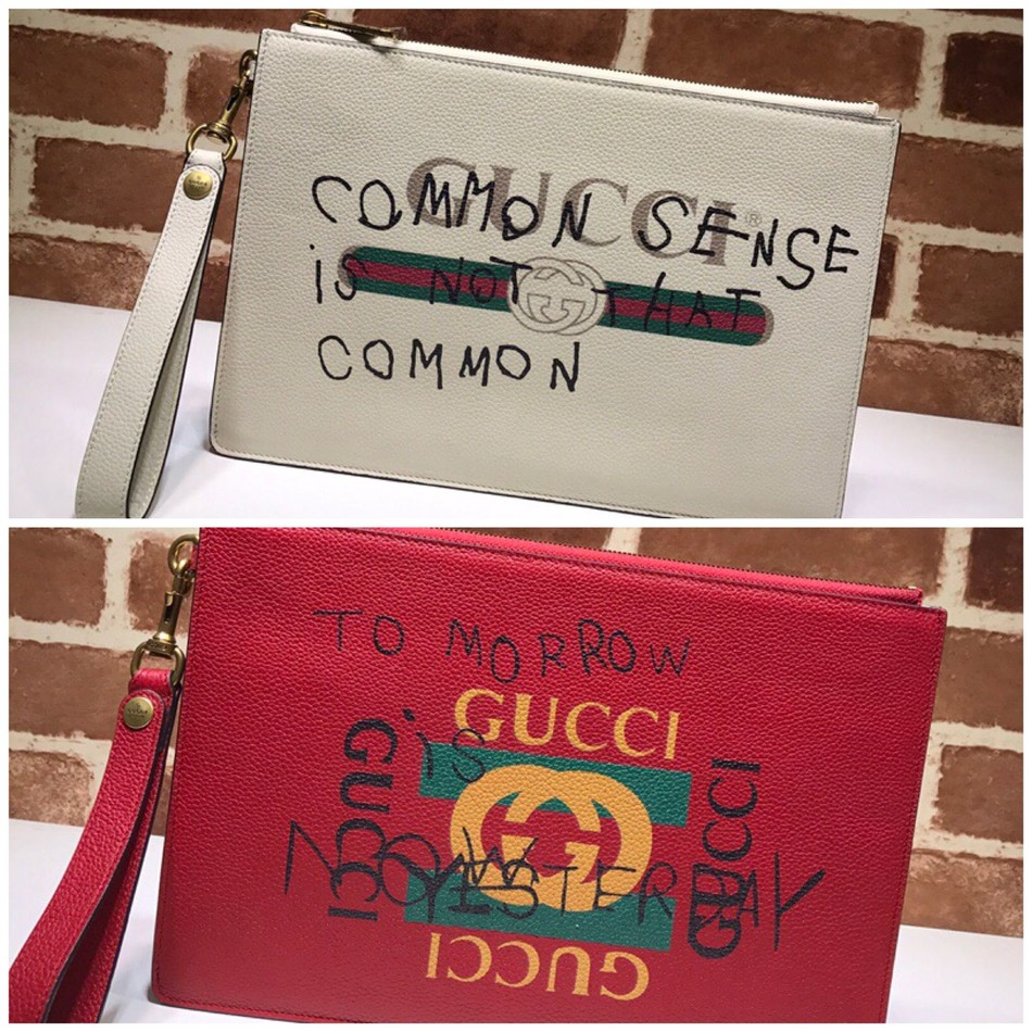 Gucci textured leather graffiti print clutch